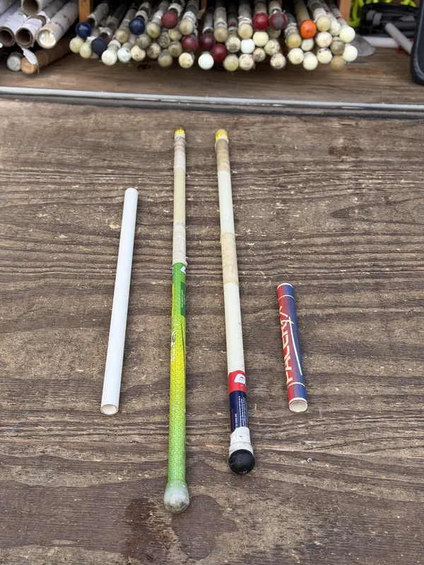 Decommissioned poles cut into stubby lengths for drill work